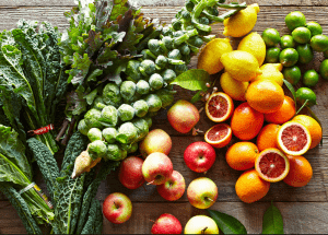 a group of fruits and vegetables on a wood surface Healthy Weight Loss Diets Alcester
